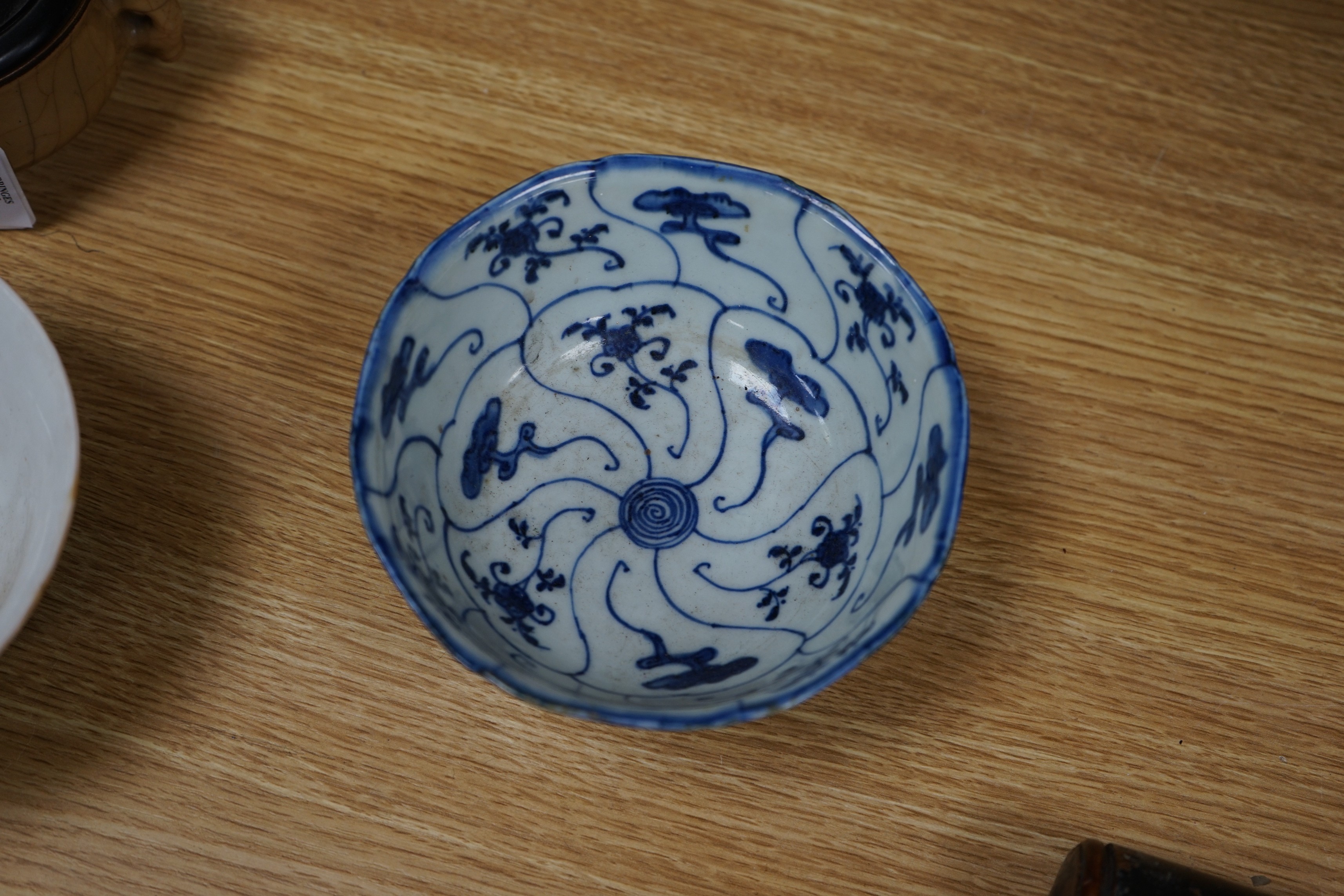 A 19th century Chinese famille rose planter, a jar and cover, two bowls and a crackle ware censer and wood cover, plater 16 cms high